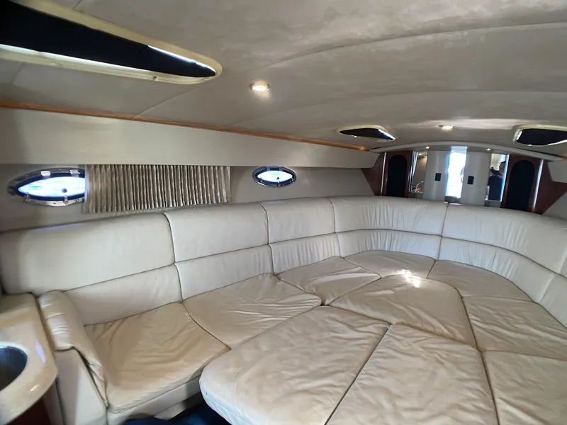 Slide: The Image of Interior of 2006 Formula 400 Super Sport yacht with white leather seating. - 23