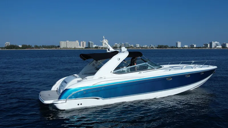 Slide: The Image of 2006 Formula 400 Super Sport boat cruising on a sunny day. - 4