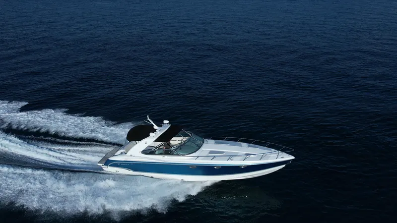 Slide: The Image of 2006 Formula 400 Super Sport boat cruising on open water. - 6