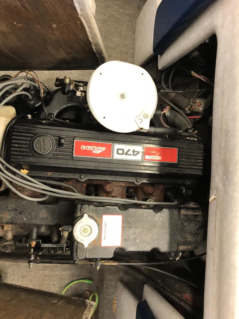 Slide: The Image of 1984 Sea Sprite 18' Cuddy Cabin boat engine, MerCruiser 470. - 15