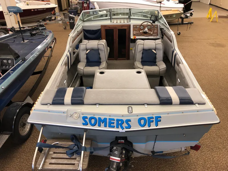 Slide: The Image of 1984 Sea Sprite 18' Cuddy Cabin boat interior with seating and dashboard. - 5