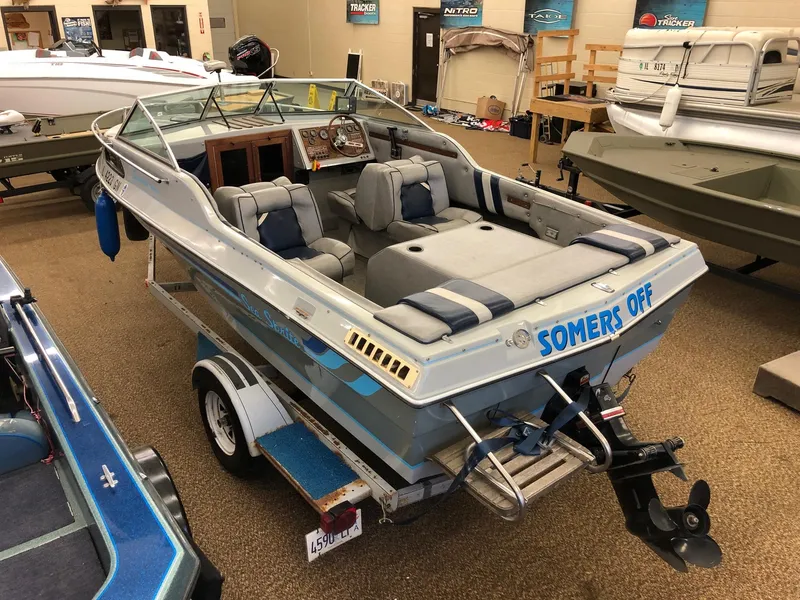 Slide: The Image of 1984 Sea Sprite 18' Cuddy Cabin boat on trailer in showroom. - 6
