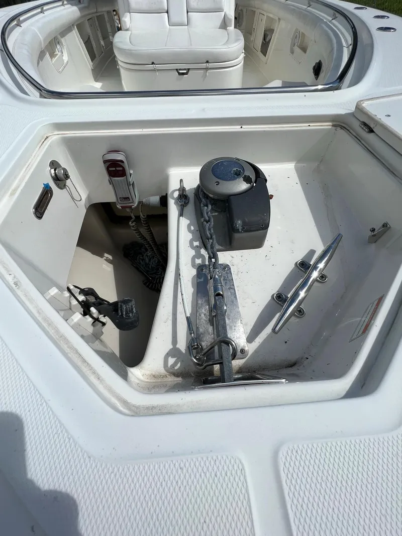 Slide: The Image of 2013 Boston Whaler 370 Outrage anchor locker and windlass system. - 15