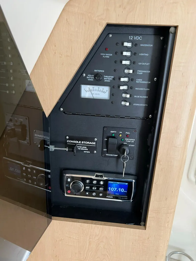 Slide: The Image of Control panel of a 2013 Boston Whaler 370 Outrage boat. - 25