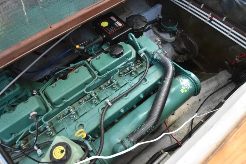 Slide: The Image of Engine compartment of a 2001 Camano 31 Trawler with a Volvo engine. - 10
