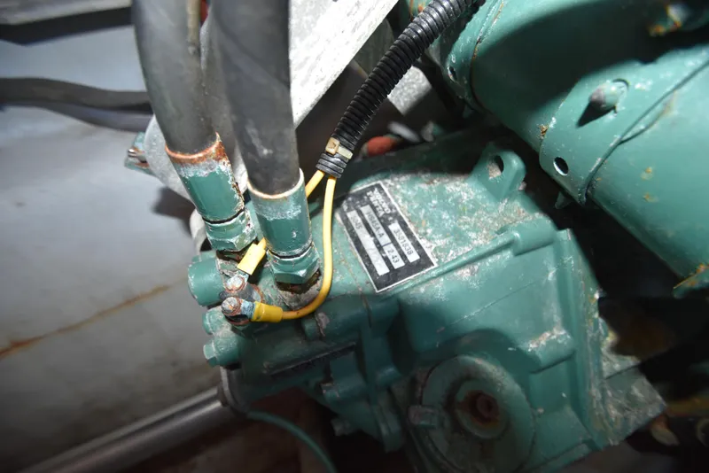 Slide: The Image of Close-up of engine components in a 2001 Camano 31 Trawler boat. - 12