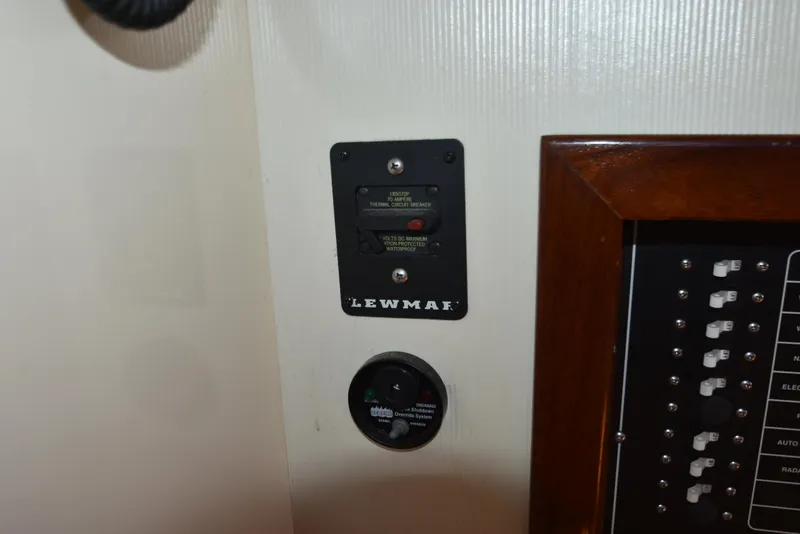 Slide: The Image of Control panel of a 2001 Camano 31 Trawler with Lewmar circuit breaker. - 29
