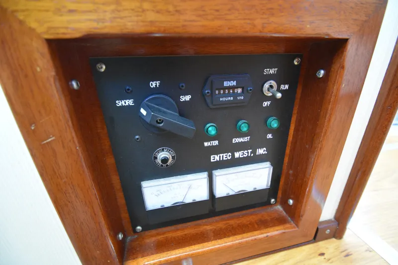 Slide: The Image of Control panel of a 2001 Camano 31 Trawler boat with Entec West, Inc. gauges. - 36