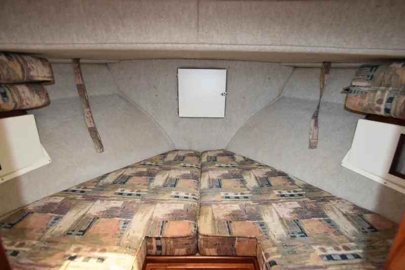 Slide: The Image of Interior cabin of 2001 Camano 31 Trawler with patterned cushions. - 45
