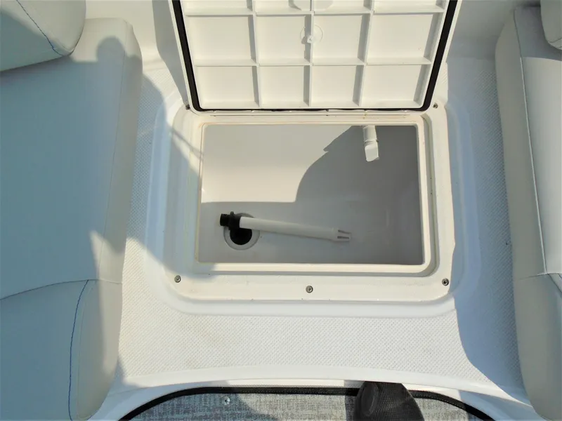 Slide: The Image of 2022 Hurricane SS188 boat storage compartment with open lid. - 10