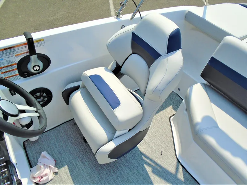 Slide: The Image of 2022 Hurricane SS188 boat interior with white and blue captain's chair. - 3