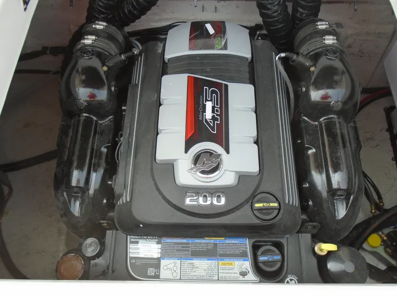 Slide: The Image of 2022 Hurricane SS188 boat engine compartment with a powerful 4.5L 200 HP engine. - 4