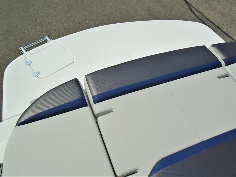 Slide: The Image of 2022 Hurricane SS188 boat with cushioned seating and storage compartment. - 9