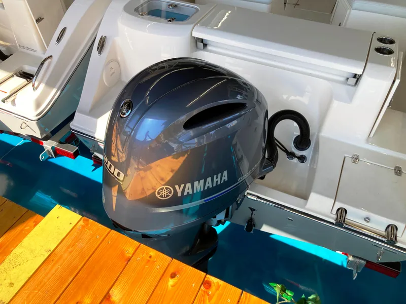Slide: The Image of 2022 Cobia 220 Dual Console with Yamaha outboard motor. - 3