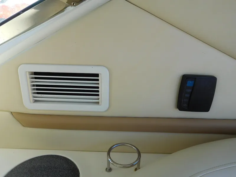 Slide: The Image of Air vent and control panel on 2005 Sea Ray 420 Sundancer boat interior. - 16