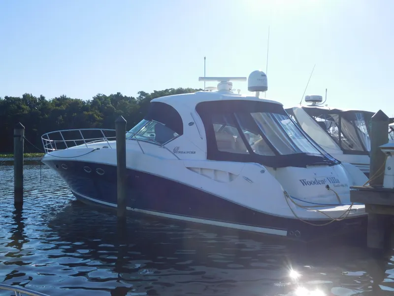 Slide: The Image of 2005 Sea Ray 420 Sundancer yacht docked in marina. - 4