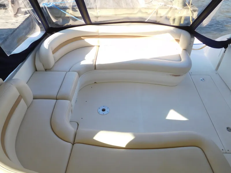 Slide: The Image of 2005 Sea Ray 420 Sundancer boat interior with beige leather seating. - 9
