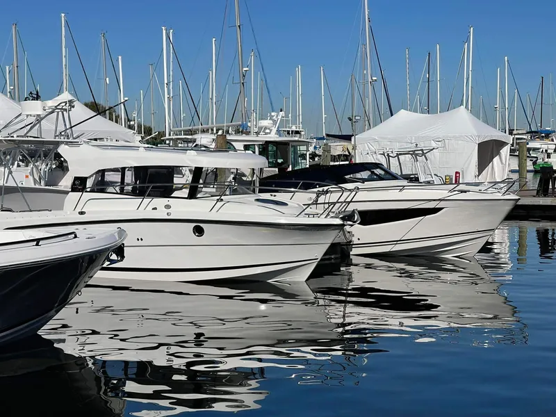 Slide: The Image of Parker Poland 800 Weekend 2022 boats docked at marina with clear blue sky. - 14