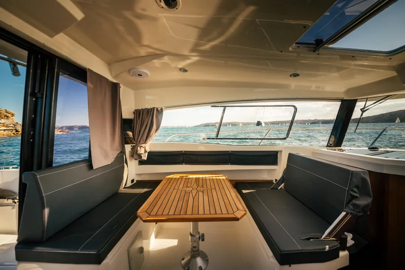 Slide: The Image of Interior of 2022 Parker Poland 800 Weekend boat with seating and table, ocean view. - 32