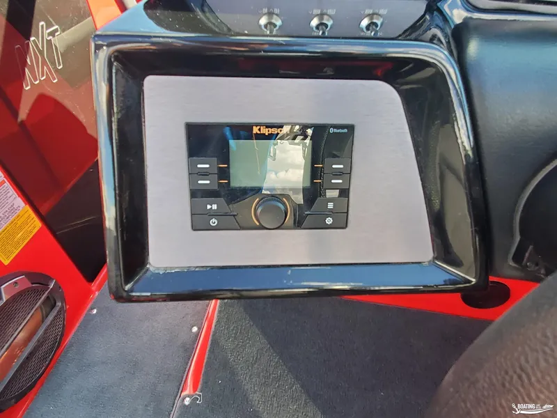 Slide: The Image of MasterCraft NXT20 2020 dashboard with Klipsch audio system and Bluetooth connectivity. - 14