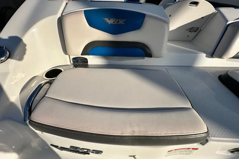 Slide: The Image of 2019 Chaparral Vortex 2430 VRX boat seat with blue and white upholstery. - 35