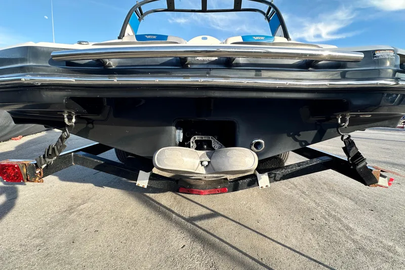 Slide: The Image of 2019 Chaparral Vortex 2430 VRX boat rear view on trailer. - 5
