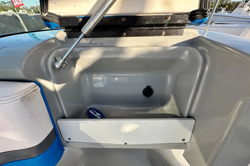 Slide: The Image of 2019 Chaparral Vortex 2430 VRX boat storage compartment with hydraulic support. - 57