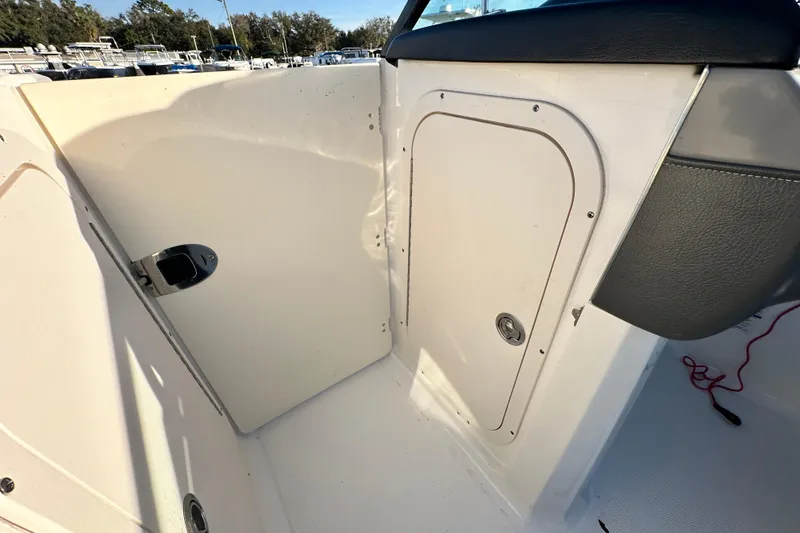 Slide: The Image of 2019 Chaparral Vortex 2430 VRX boat interior storage compartment. - 65