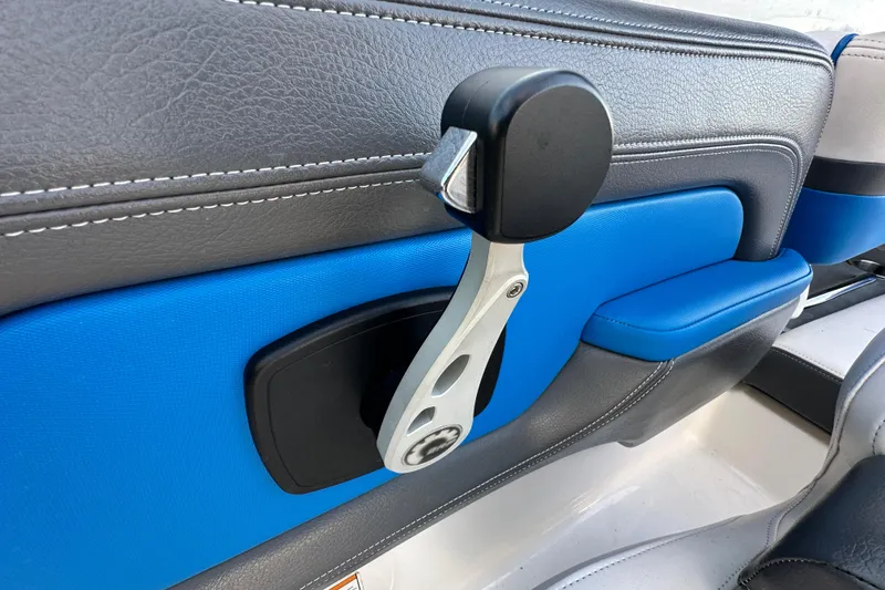 Slide: The Image of 2019 Chaparral Vortex 2430 VRX interior with blue and gray seating detail. - 85