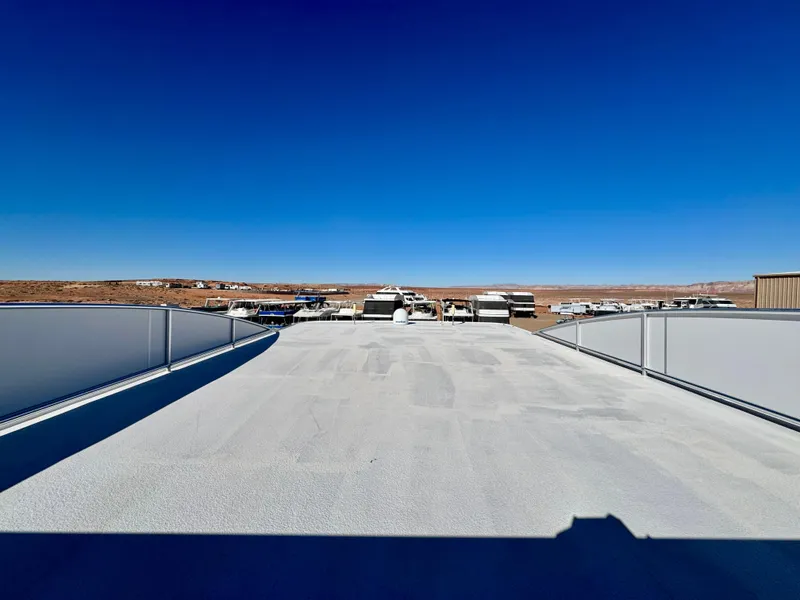 Slide: The Image of Rooftop view of Adonia Obsession Share Trip #9, 2021, under clear blue sky. - 32