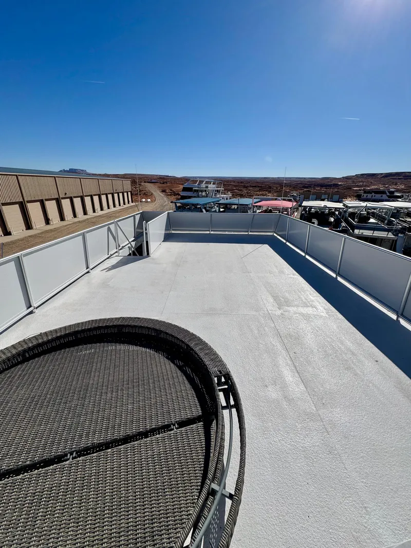 Slide: The Image of Rooftop deck of Adonia Obsession Share Trip #9, 2021, with clear blue sky. - 33