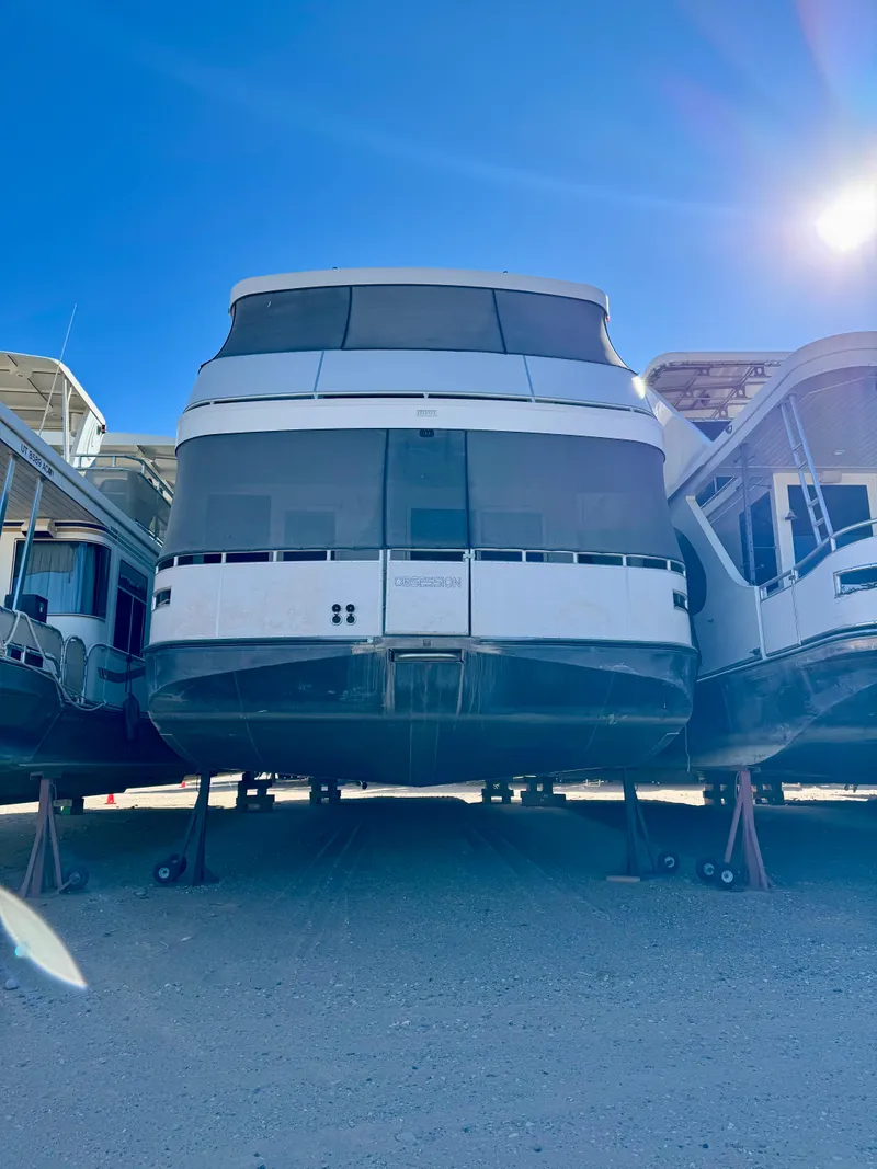 Slide: The Image of Houseboat Adonia Obsession Share Trip #9, 2021 model, docked under clear blue sky. - 37