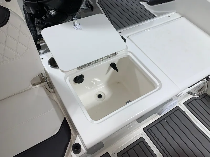 Slide: The Image of Open storage compartment on 2024 Bayliner Trophy 20CC boat. - 4
