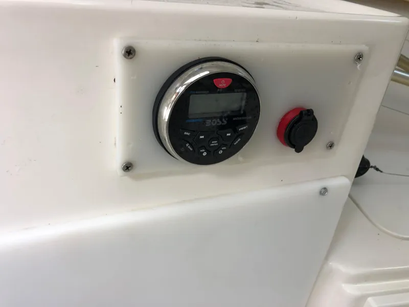 Slide: The Image of Control panel on a 2000 Cobia 240 Walk-Around boat. - 20