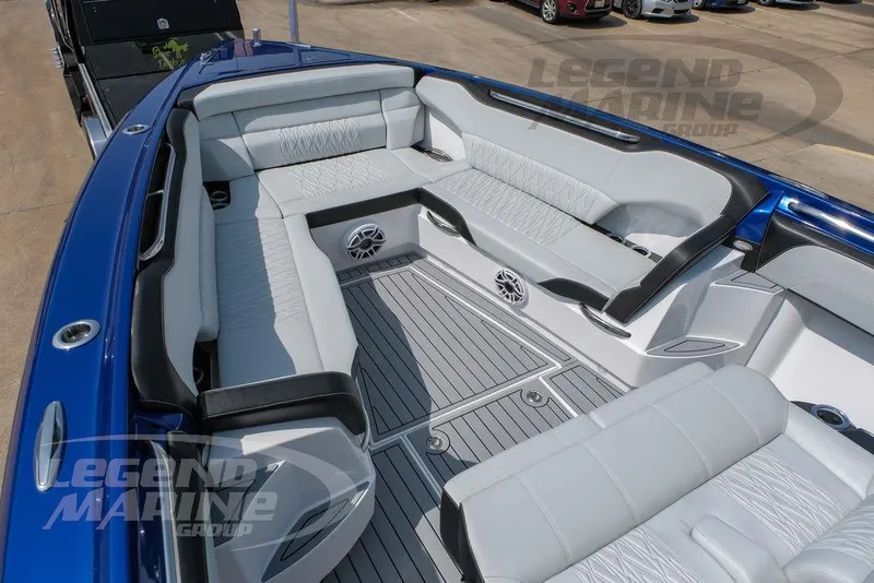 Slide: The Image of 2025 Nor-Tech 450 Sport boat interior with luxurious seating and modern design. - 35