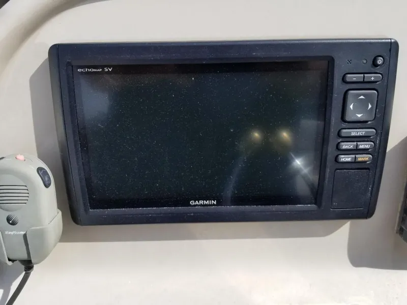 Slide: The Image of Garmin marine GPS system on 2001 Sea Ray 290 Amberjack boat dashboard. - 21