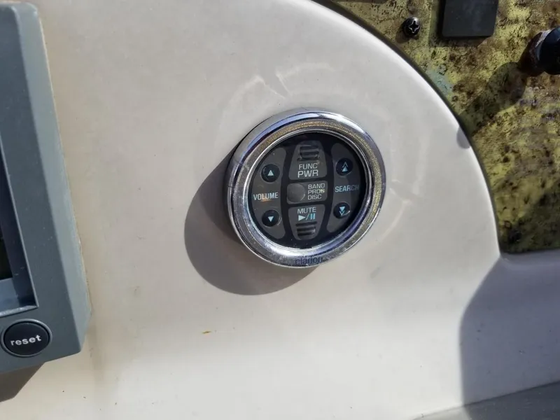 Slide: The Image of Control panel on a 2001 Sea Ray 290 Amberjack boat dashboard. - 23