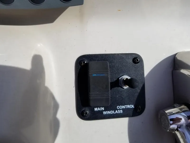 Slide: The Image of Control panel for windlass on 2001 Sea Ray 290 Amberjack boat. - 24