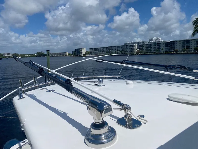 Slide: The Image of 2019 Mag Bay Center Console boat on water with cityscape background. - 7
