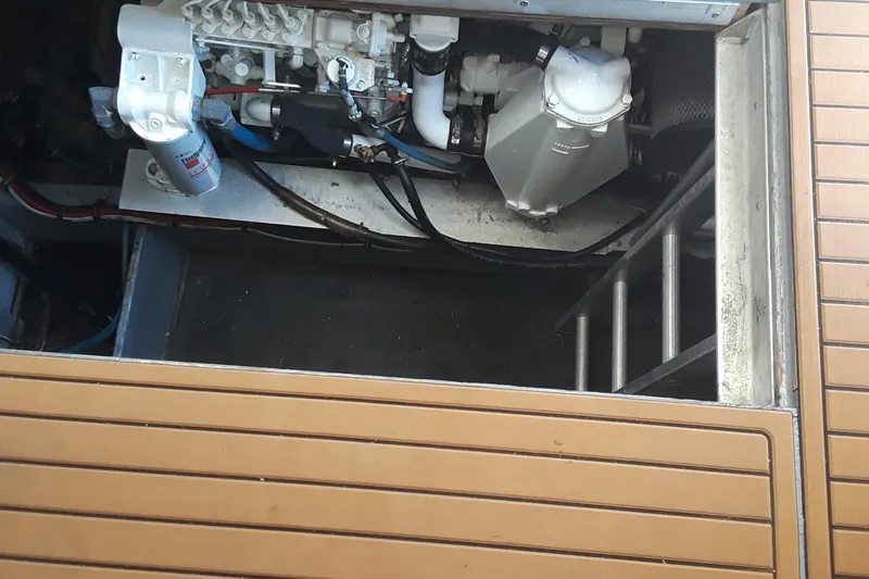 Slide: The Image of Engine compartment of a 1987 Blackfin 36 Convertible boat. - 33