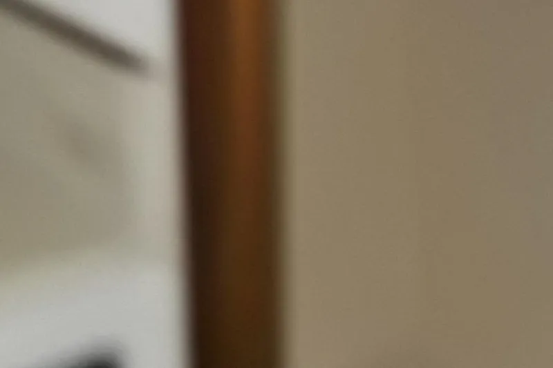 Slide: The Image of Blurry interior view of a 1987 Blackfin 36 Convertible boat. - 44