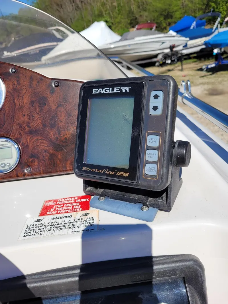 Slide: The Image of Eagle StrataView 128 fish finder on 2000 Hurricane Fun Deck 201IO boat dashboard. - 7