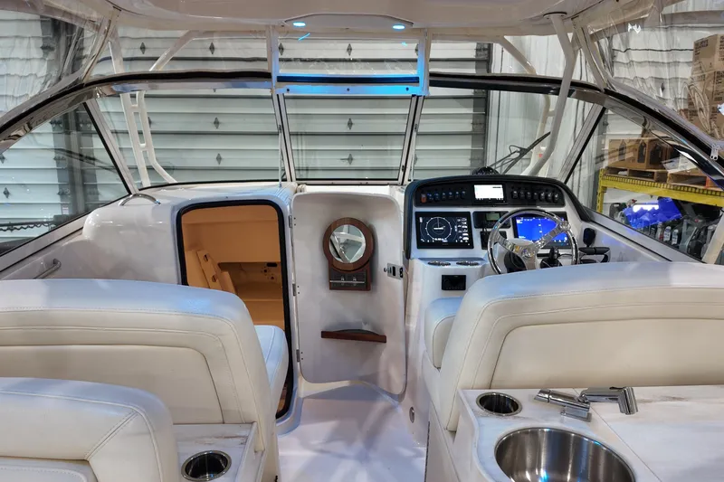 Slide: The Image of 2024 Grady-White Freedom 307 boat interior with sink and toilet. - 16