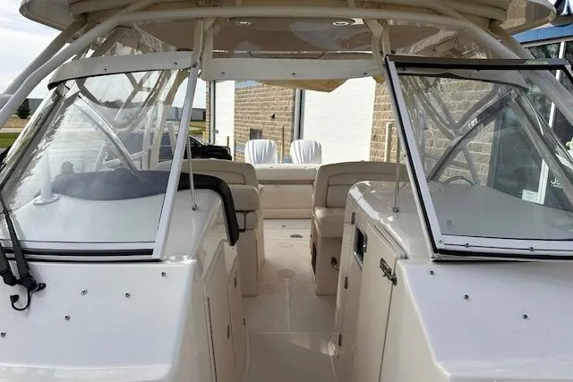 Slide: The Image of 2024 Grady-White Freedom 307 boat interior with open cockpit and seating. - 24