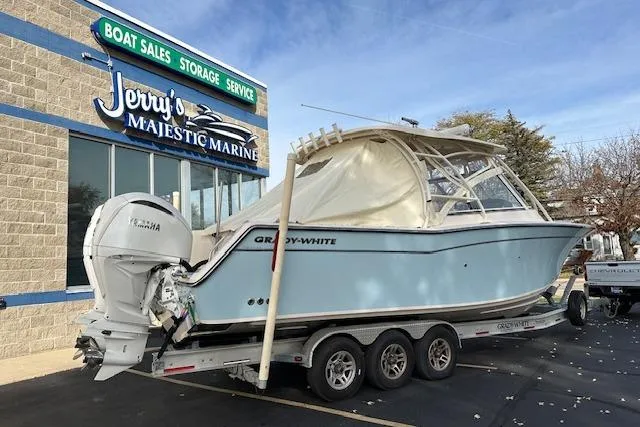 Slide: The Image of 2024 Grady-White Freedom 307 boat on trailer at Jerry's Majestic Marine dealership. - 34
