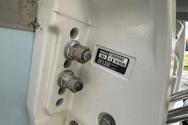 Slide: The Image of Close-up of a 2024 Grady-White Freedom 307 boat engine mount with Yamaha label. - 39