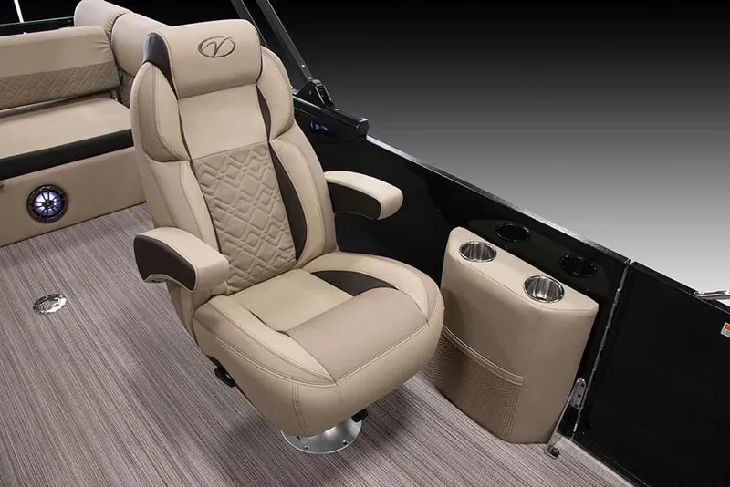 Slide: The Image of Luxurious captain's chair on 2022 Veranda VP25VLC pontoon boat with cup holders. - 22