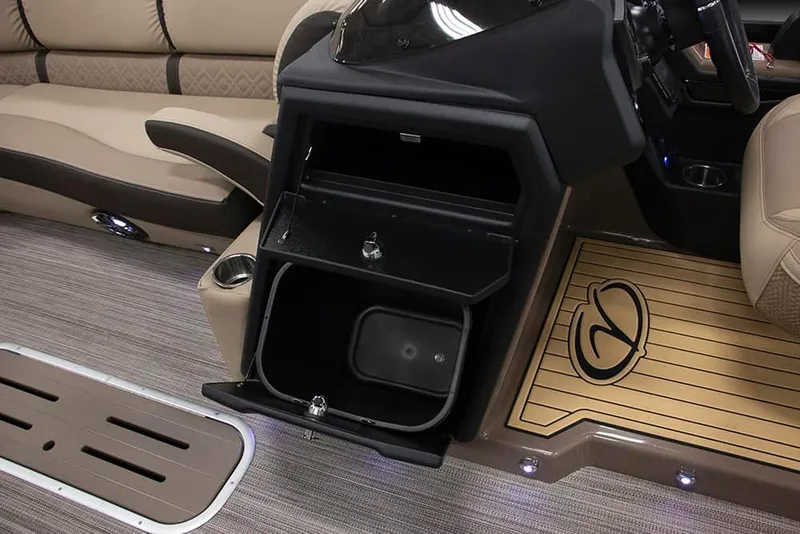 Slide: The Image of 2022 Veranda VP25VLC boat interior with open storage compartments and seating. - 4