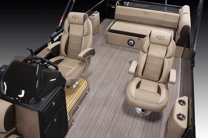 Slide: The Image of 2022 Veranda VP25VLC boat interior with beige seating and modern dashboard. - 5