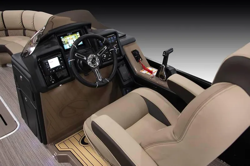 Slide: The Image of 2022 Veranda VP25VLC boat cockpit with steering wheel, control panel, and captain's chair. - 24